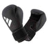 Black ADIDAS Hybrid25 AEROREADY boxing gloves with breathable mesh wrist support and synthetic leather shell for beginner training use.