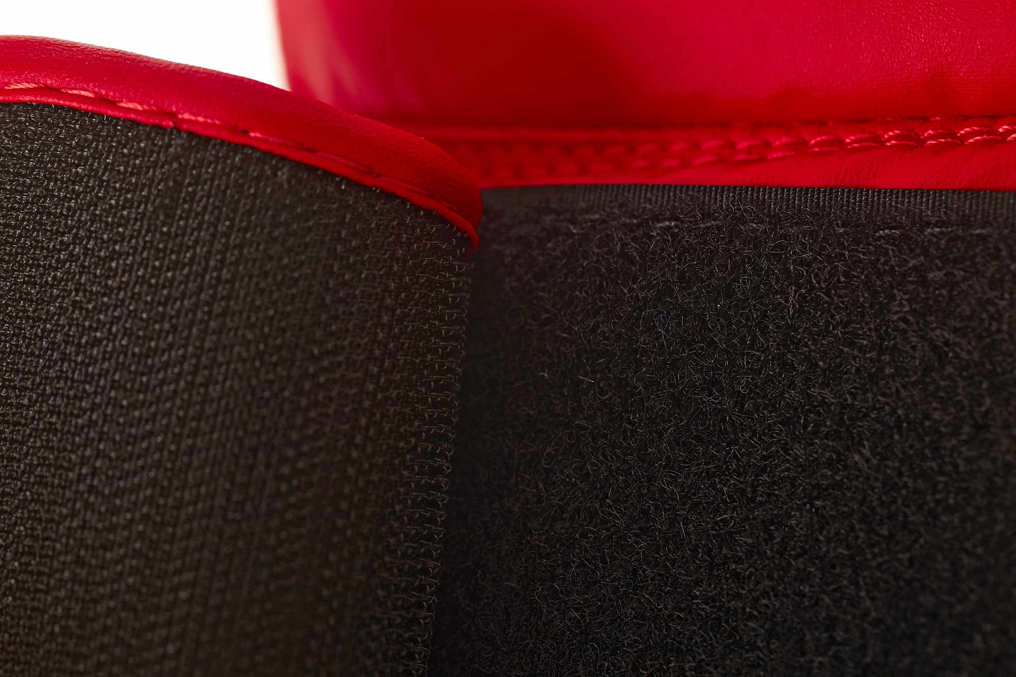 Detailed close-up of red ADIDAS Hybrid25 glove&