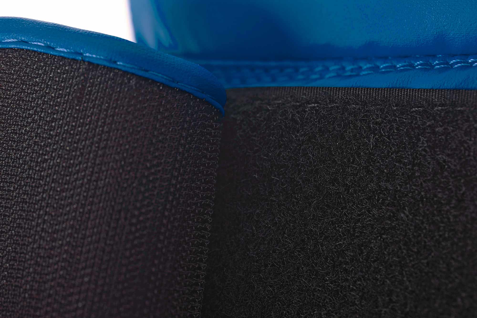 Close-up of blue ADIDAS Hybrid25 glove&