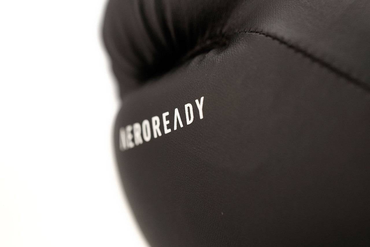 Macro shot of black ADIDAS Hybrid25 glove with AEROREADY branding, showcasing moisture-wicking surface.
