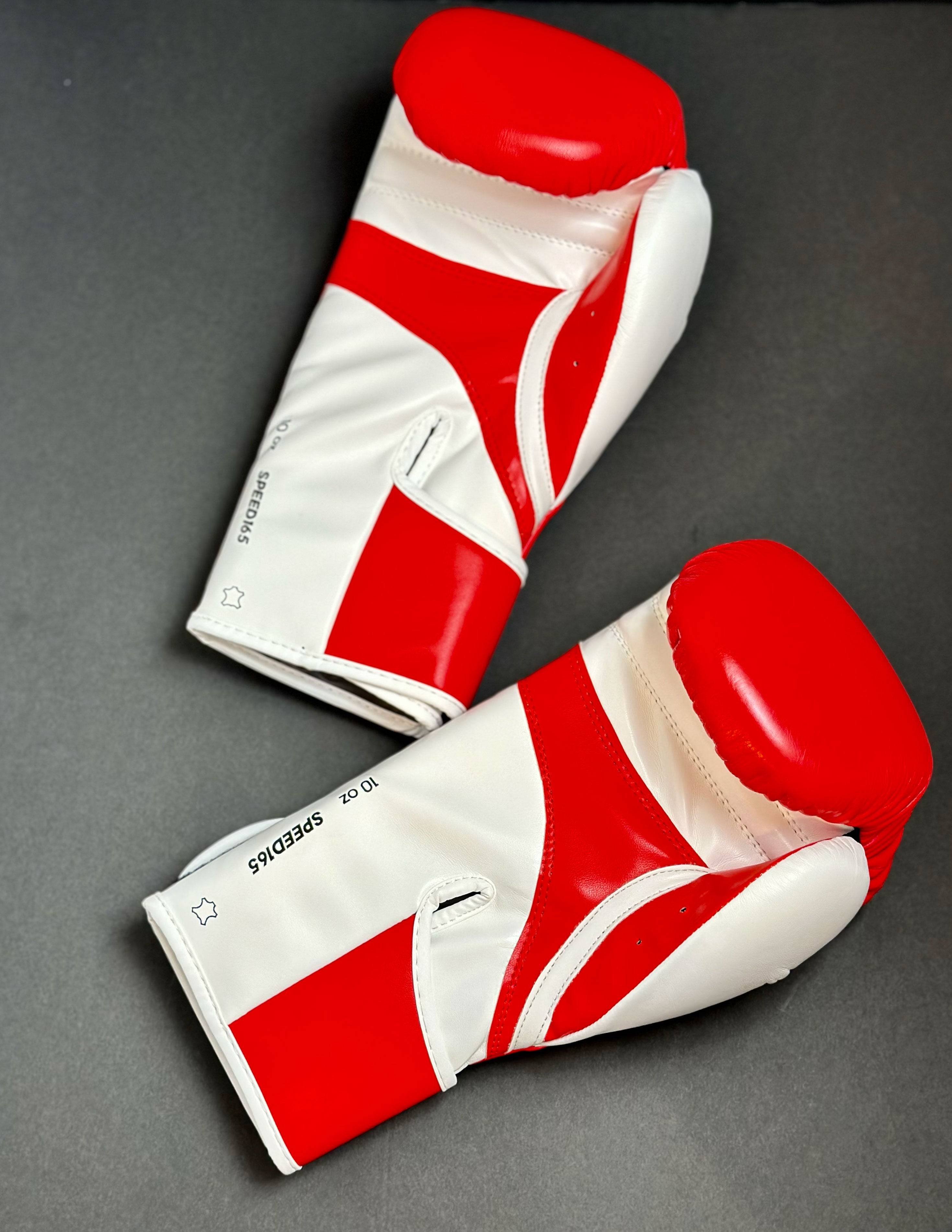 Adidas WAKO Approved Kickboxing Fight Gloves, Cowhide Cuir Leather Speed 165 adiSBG165 Competition Gloves 10 Oz Red, black background